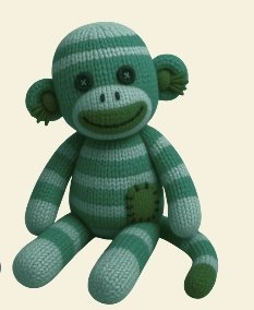Earl, an olive green sock monkey